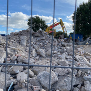 Demolition of a concrete forecourt.