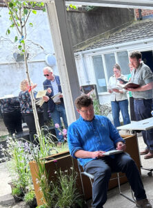 People sketching in a workshop.